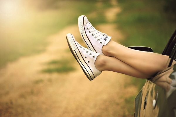 hybrid-car-beautiful-leg-with-shoes-out-through-car-window